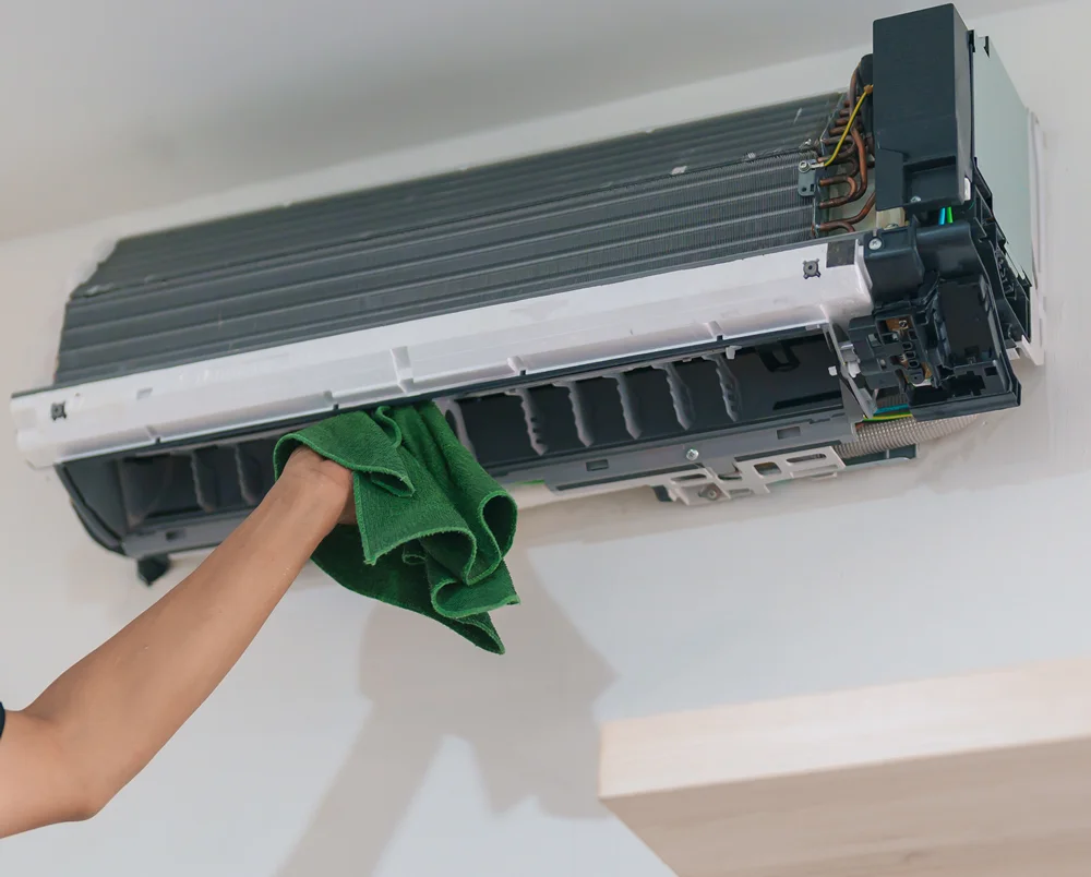 Man Technician Maintenance of Air Conditioner
